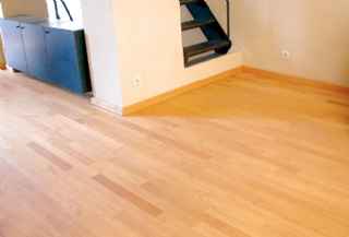 Pose de plancher de bois franc