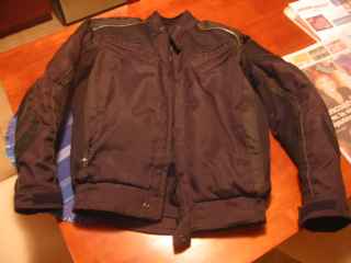   Manteau noir moto comme neuf